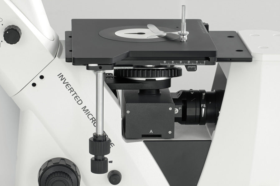 microscope stage with condenser and adjustment knobs