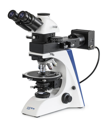 microscope setup with trinocular tube, rotating stage, polarizing filters, and Köhler illumination.