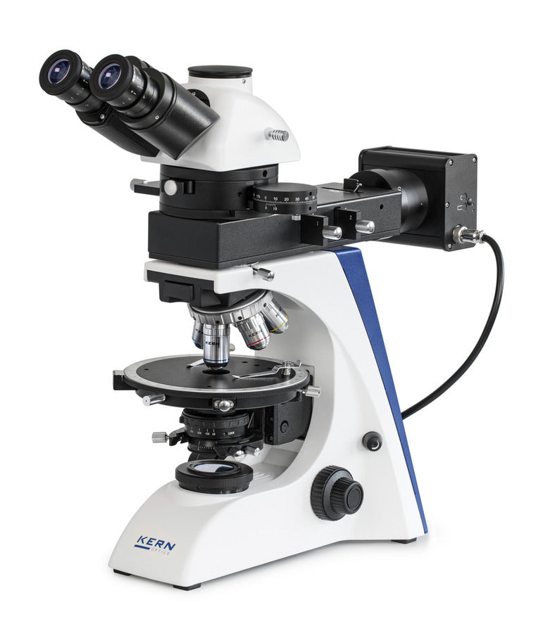 microscope setup with trinocular tube, rotating stage, polarizing filters, and Köhler illumination.