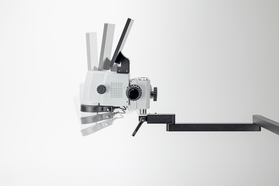 Side view of a digital video microscope head showing adjustable tilt positions on an articulating arm