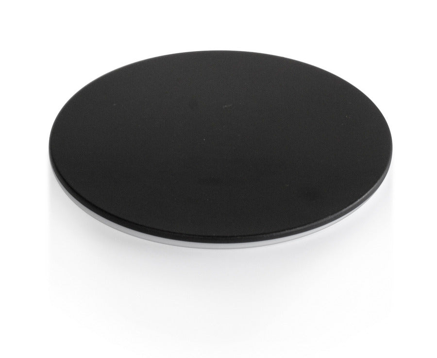 Black round glass stage plate for a microscope.