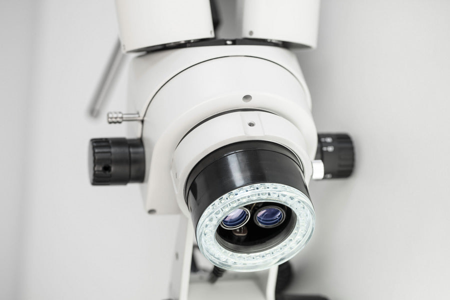 Stereo microscope with LED ring light attached to objective.